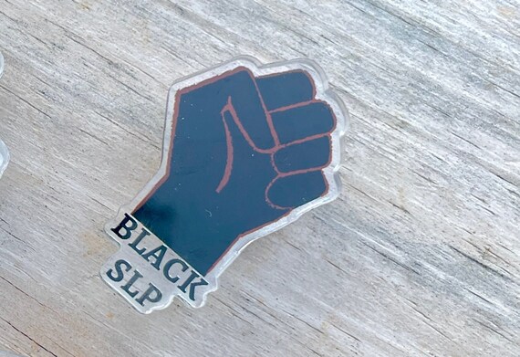 black power croc charms