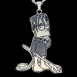 May include: Silver pendant necklace featuring a cartoon character with a devil tail and a trident. The character is wearing a striped shirt and has a black and white design.