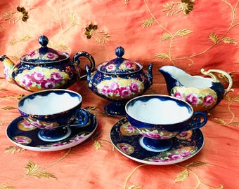 Gorgeous Antique Hand Painted Porcelain Teapot, Cream, Sugar and cup&saucer Set
