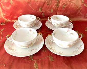 A group of 4 Theodore Haviland Limoges France Cups/saucer sets