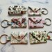 see more listings in the Keychains section