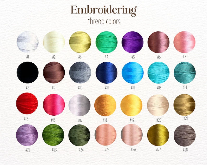 May include: A color chart of embroidery thread options. The image displays 28 thread colors, each in a circular form, with a corresponding number. Colors range from white, black, and grey to vibrant hues like red, pink, and teal. The text "Embroidering thread colors" is at the top.