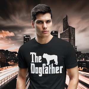 May include: A black t-shirt with a white bulldog silhouette and the text "The Dogfather" printed on the front.