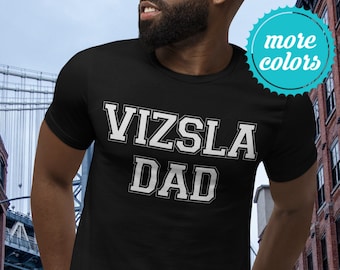 May include: Black t-shirt with white text that reads "Vizsla Dad".