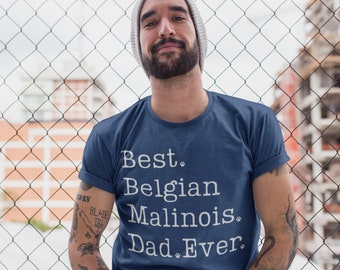 May include: A man wearing a blue t-shirt with white text that reads "Best Belgian Malinois Dad Ever".