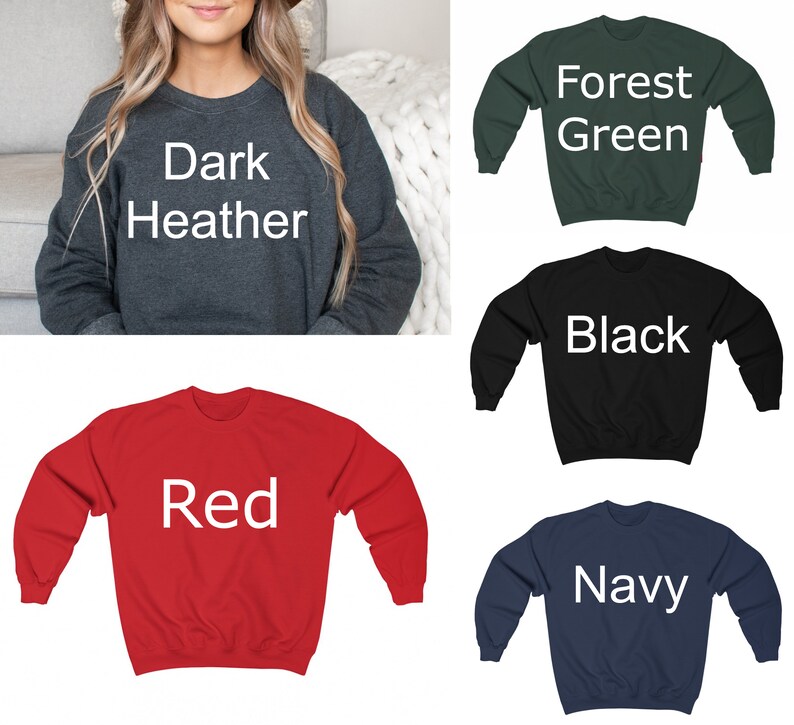 May include: Five crewneck sweatshirts in different colors: dark heather, forest green, black, red, and navy. Each sweatshirt has the color name printed in white on the front.