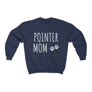 May include: A navy blue sweatshirt with the text "POINTER MOM" in white with two white paw prints.