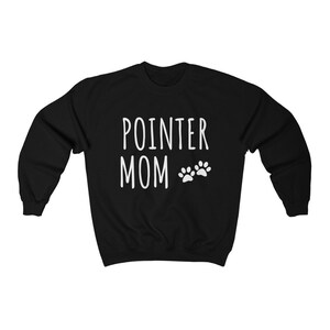 May include: Black sweatshirt with the text "POINTER MOM" and two white paw prints.