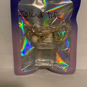 May include: A set of three ceramic mugs with a speckled, matte finish. The mugs are in shades of cream, light gray, and dark gray. Each mug has a simple, minimalist design and a rounded handle.