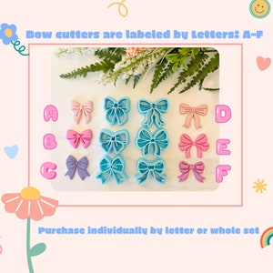 May include: Six different bow-shaped cookie cutters, labelled A through F. The cutters are in pink, blue, and purple. The text "Bow cutters are labelled by Letters: A-F" and "Purchase individually by letter or whole set" are also visible.