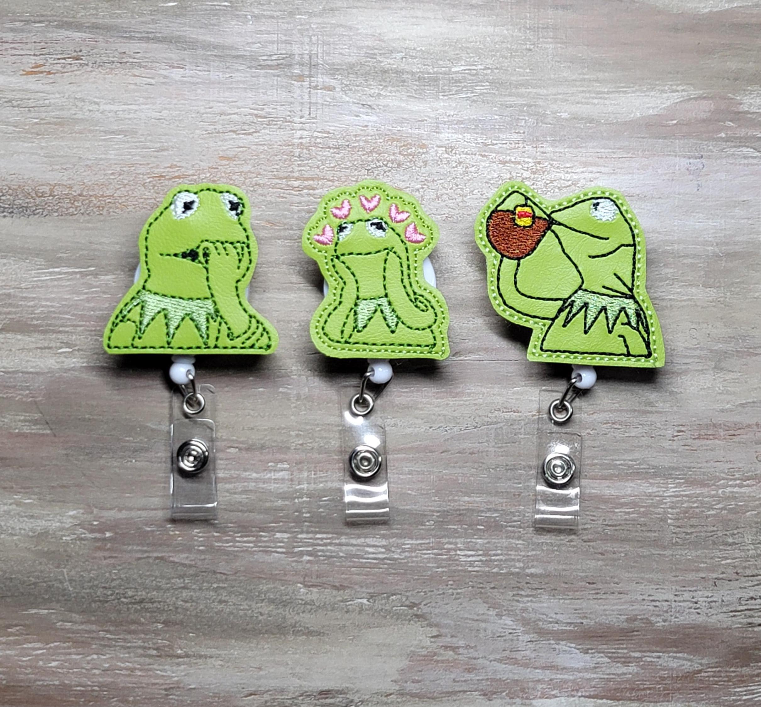 Frog badges | character badges | animal badges | memes | none of my business | nurse badges | name tag | ID holder | badge reels | feltie