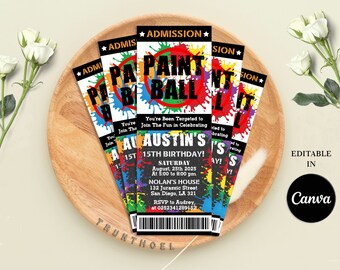 May include: A colorful ticket invitation for a paint ball birthday party. The ticket has a black and white background with colorful paint splatters. The text on the ticket reads "Paint Ball" and "Austin's 15th Birthday!" The ticket also includes the date, time, and location of the party.