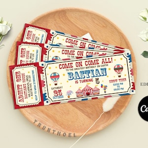 May include: Red, white, and blue circus ticket invitation for a birthday party. The ticket says "Come on Come All! To the greatest birthday on Earth! Bastian is turning 5." The ticket also includes a date, Saturday, October 25th, and a time, 02:00 PM to 05:00 PM.