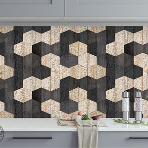May include: A kitchen backsplash with a geometric pattern of black and white wood tiles. The tiles are arranged in a hexagonal pattern, creating a modern and stylish look.
