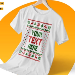 May include: White t-shirt with a red and green Christmas sweater design. The design includes snowflakes, reindeer, and Christmas trees. The text "YOUR TEXT HERE" is in the center of the design.