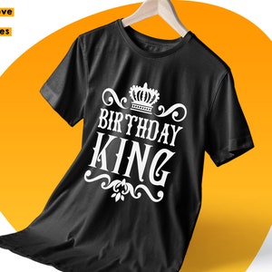 May include: Black t-shirt with a white crown and the text "Birthday King" printed on the front.