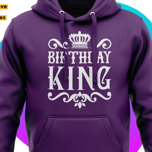 May include: Purple hoodie with a white graphic design that says "Birthday King" with a crown above the text.
