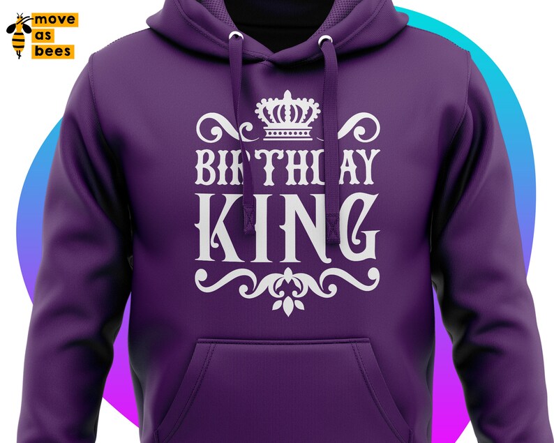 May include: Purple hoodie with a white graphic design that says "Birthday King" with a crown above the text.
