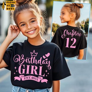 May include: Black t-shirt with pink text that says "Birthday Girl Est. 2013" with a crown and hearts. The back of the shirt says "Chapter 12" in pink text.