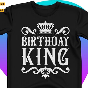 May include: Black t-shirt featuring a white crown and the text "Birthday King" in a decorative font.