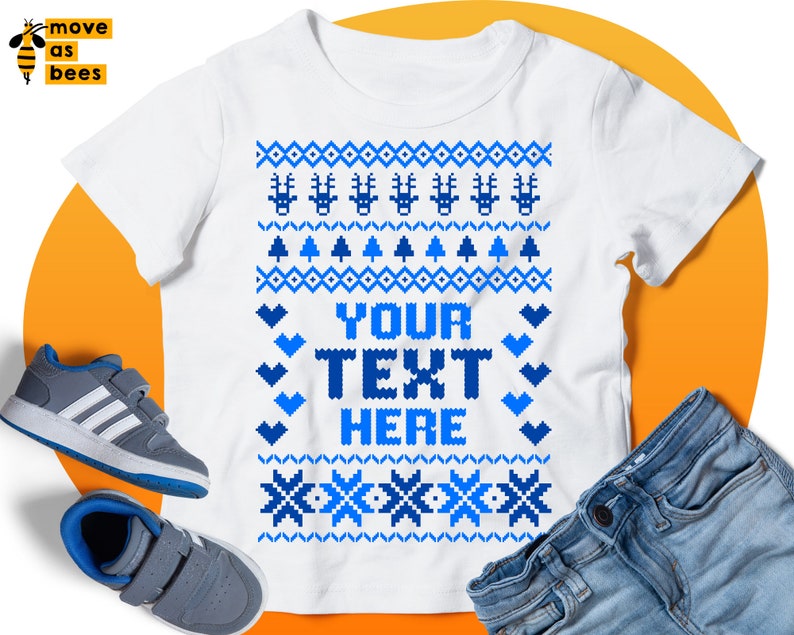 May include: White t-shirt with a blue and white Christmas-themed pattern. The text "YOUR TEXT HERE" is in the center of the shirt.