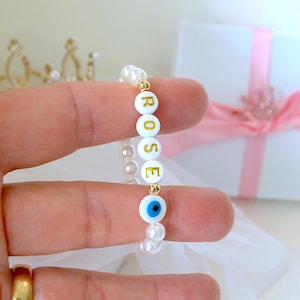 Personalized Pearl Evil Eye Baby Bracelet – Custom Name Jewelry with Natural Shell Protection Charm