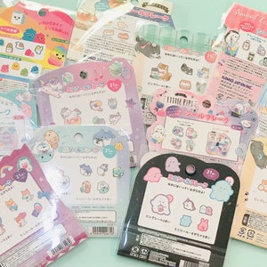 May include: A collection of 10 colorful sticker sheets featuring various cartoon characters. Each sheet has a different theme, including animals, food, and everyday objects. The stickers are perfect for adding a touch of whimsy to journals, planners, and other items.