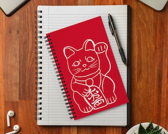 Bullet journal A5 spiral binding with drawing Japanese lucky cat pencil Maneki-neko white on red background for fans of Japan
