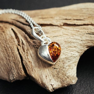 Silver heart pendant. Natural Baltic amber romantic gift. Love symbol. Unique heart pendant. Two halves of the heart.