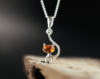 Delicate cat pendant with amber. The highest quality silver 925 and natural Baltic amber. Gift for cat lovers. Cute kitties.