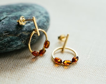 Amber circle stud earrings, 18k gold plated – marquise cognac Baltic amber, minimalist design.