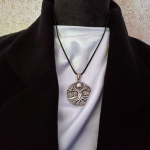 Beautiful large round Gaia Tree of Life double sided Pendant in Stainless Steel.  Really beautiful quality item.