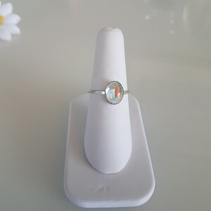 Swarovski Crystal ring in Sterling Silver.  Fabulous Aurora Borealis effects.  Stunningly simple.  UK Size Q