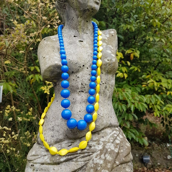 Vintage Plastic Fantastic.  Long necklaces from th
