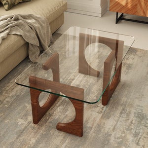Origin Coffee Table with chestnut finishing on legs and tempered glass tabletop, rounded edges (radius 6 cm) use at home or office for modern design.