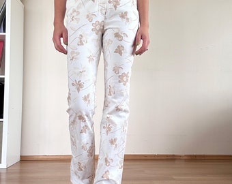 pantalon évasé à fleurs vintage Dans Blanc | Jean taille haute style hippie | Jean skinny extensible pour femme