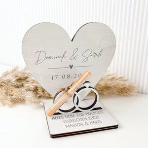Money gift for the wedding made of wood printed with desired text - greeting message, congratulations individually for the bridal couple