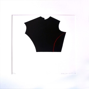 May include: Abstract art print. A black geometric shape with a red curved line is set against a white background. The artwork is framed in a white mount and frame. The print is numbered 11/20 and signed by the artist.
