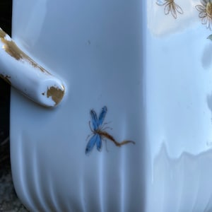 Vintage fine porcelain coffee maker and its two cups