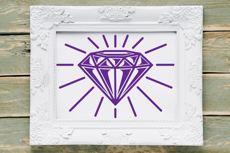 May include: A white picture frame with a purple diamond graphic inside. The diamond has a sunburst design behind it.