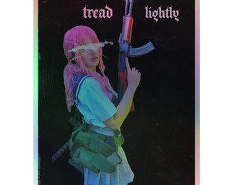 May include: A pink-haired person in a school uniform holds a black and red rifle. The background is black with the text "tread lightly" in white.