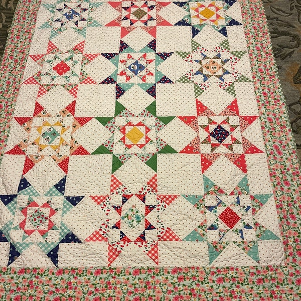 Quilt- handmade in pet-free, smoke-free home by me,  54 inches x 70 inches  Made with 'Summer Picnic' fabric line.