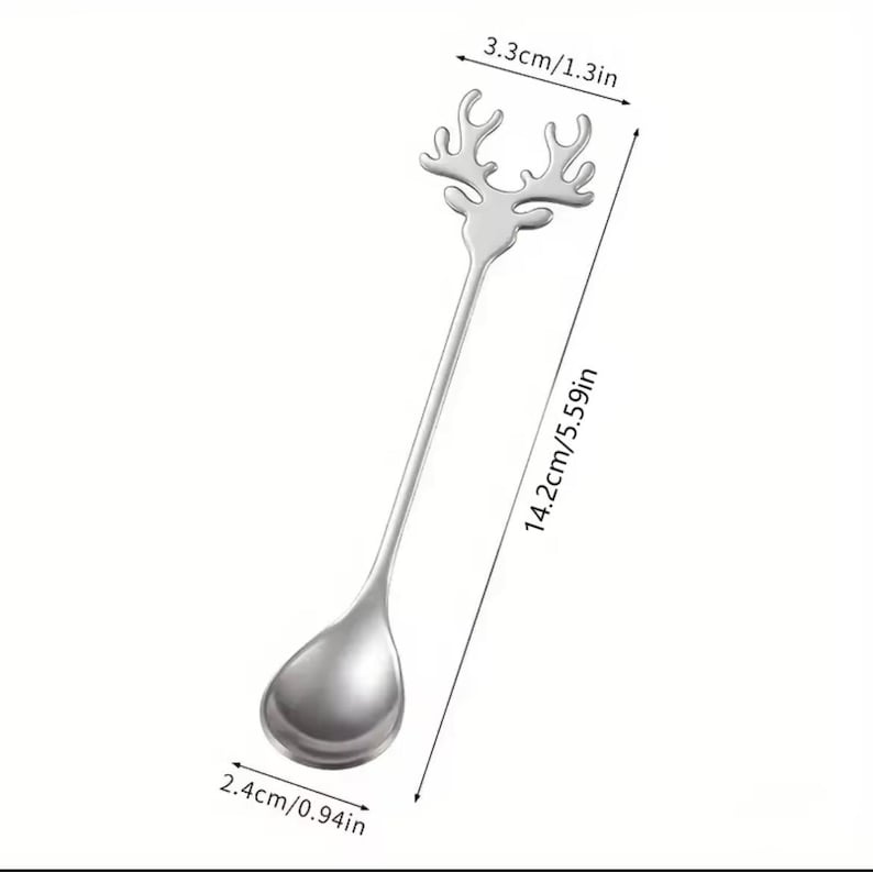 May include: Silver reindeer stirring spoon with a long handle, measuring 5.59 inches in length and 0.94 inches wide.