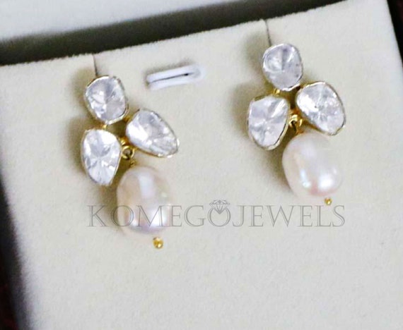 Polki Diamond Stud Earrings with Three Stones Rhodium on Sterling Silver Polki Diamond Stud Earrings with Three Stones Rhodium on Sterling Silver