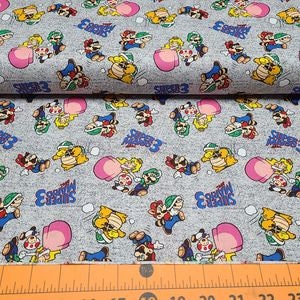 Springs Creative Nintendo Mario Brothers Light Grey Cotton Fabric