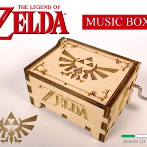 Boîte à musique à manivelle en bois sculpté et gravé avec dessin -  Référence de cette boîte à musique en bois: BOITE-HS001-ZELDA