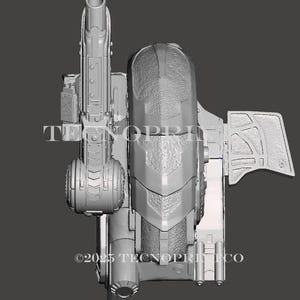May include: A gray, 3D-printed model of a futuristic vehicle or weapon, featuring intricate details and a complex design. The model has a cylindrical barrel, a central body with textured panels, and a wing-like structure. The text "TECNOPRINT" and "&copy;2025 TECNOPRINT CO" are visible.