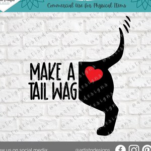 May include: Black and white silhouette of a dog with a wagging tail and a red heart on its rear end. The text "MAKE A TAIL WAG" is written in black letters on a white background.