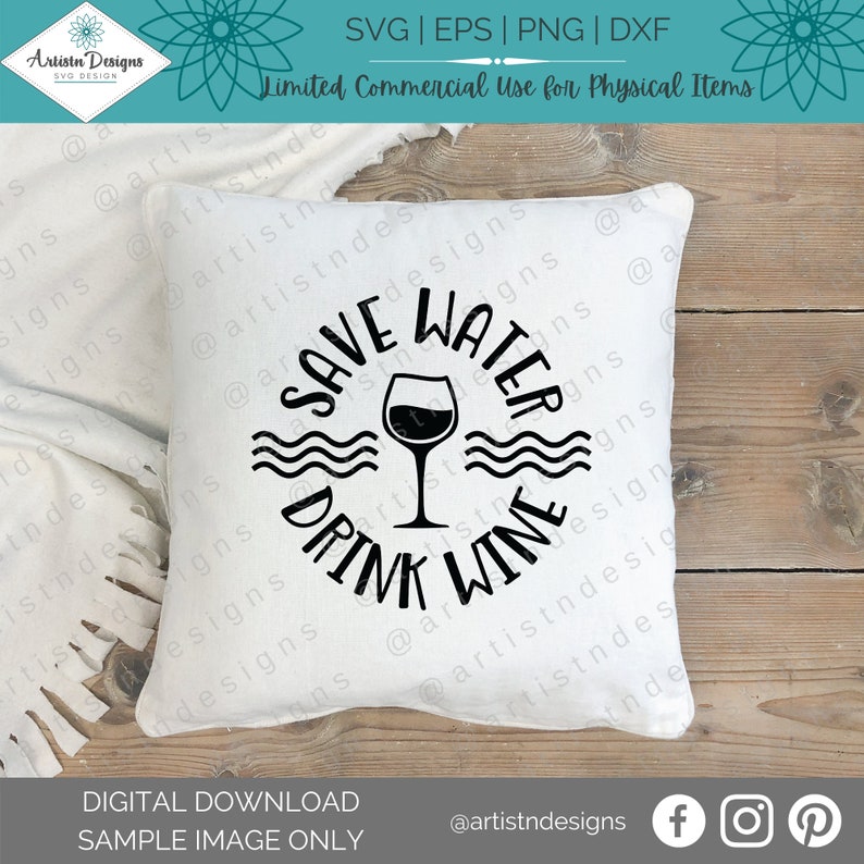 May include: White pillow with black text that reads "Save Water Drink Wine" with a wine glass graphic and wavy lines. The text is in a circle.