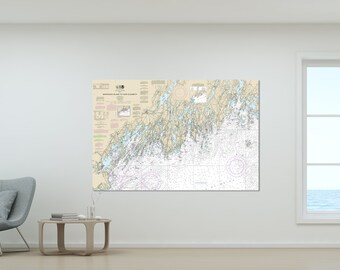 May include: A nautical chart of the coast of Maine, showing the islands and waterways from Monhegan Island to Cape Elizabeth. The chart is printed on paper and has a white background with blue, green, and brown lines and text.